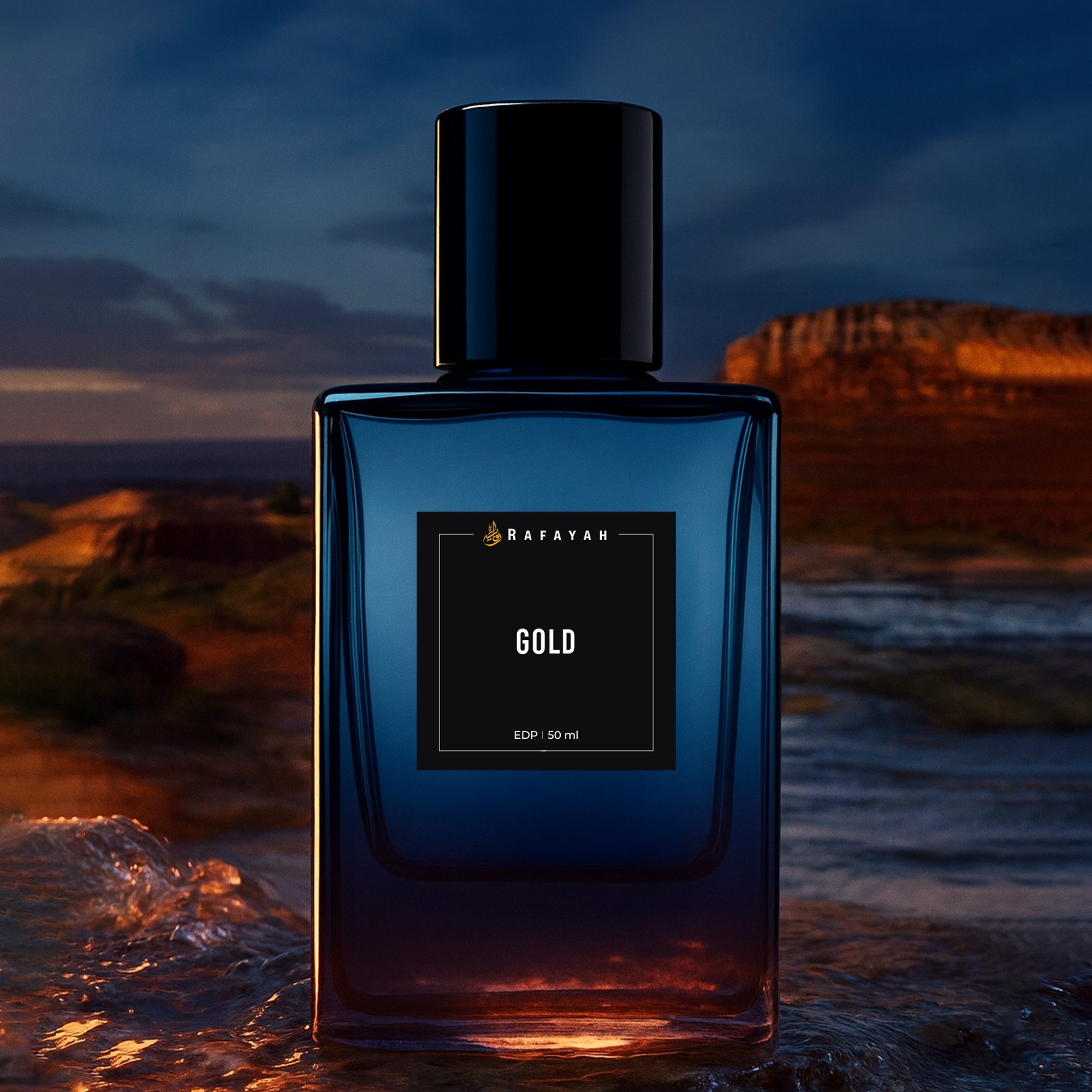 Rafayah Gold perfume bottle with black cap, set outdoors at sunset near rocky landscape.