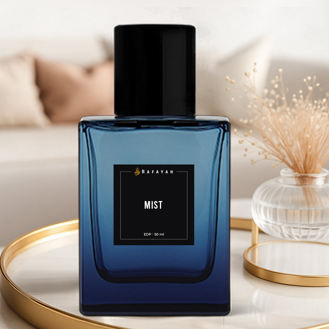 Rafayah Mist perfume bottle on tray with dried flowers, luxury home decor setting